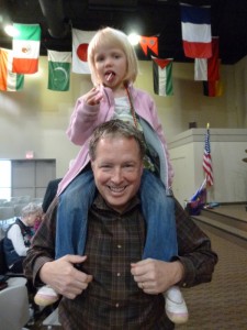 We get shoulder rides from Papa Bill and lollipops at this church!