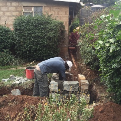 Laying new connection pipes and building manholes at every joint/change of direction, for maintenance access in the future.