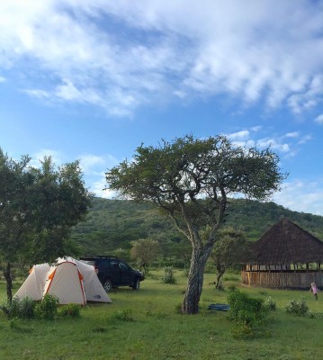 Campsite, with permanent bandas built for campers by the Conservancy. Bandas are very helpful to provide shelter in the middle of a rainstorm at night, Amelie discovered.
